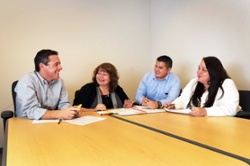 People in a meeting at a conference table