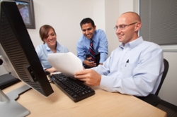 People reviewing document