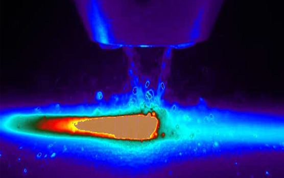 Image of Laser Engineered Net Shaping metal AM process captured with a FLIR thermal imaging system