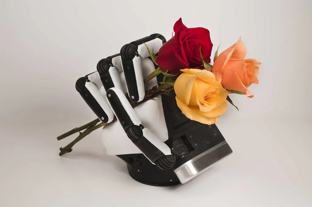 Robotic hand with roses