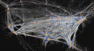 FINDING PATTERNS IN BIG DATA — This color map shows take-offs (red ends) and landings (blue ends) for all the flights in the U.S. from a single day. A Sandia team has earned a 2020 R&D 100 Award for creating Tracktable, a technology that uses machine learning to analyze large data sets. (Image courtesy of Andy Wilson)