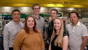 Guangping Xu, right, with his team of Sandia National Laboratories researchers, from left, Hongyou Fan, Haley Davis, Chad McCoy, Jens Schwarz and Melissa Mills, won an R&D 100 award for Ultra-Stable Thermally Excellent Advancements in Material Strength.