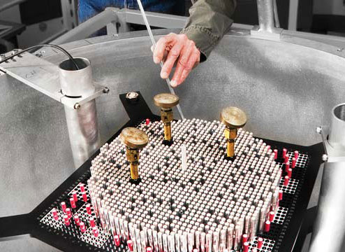 Researcher testing electronic component