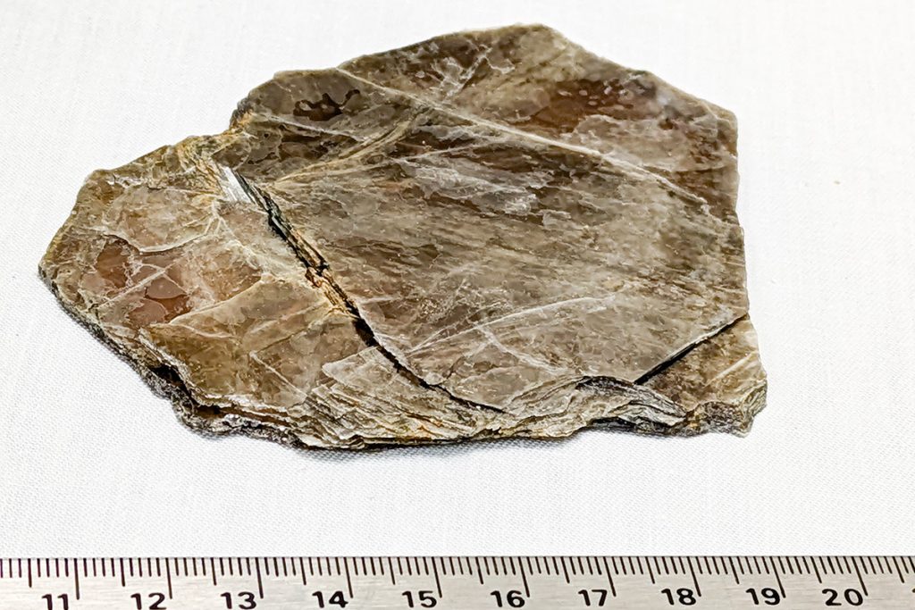 Muscovite mica, used in many materials science applications, is known for its extremely flat and flaky layers, making it highly susceptible to hostile environmental conditions. (Photo by Anastasia Ilgen)