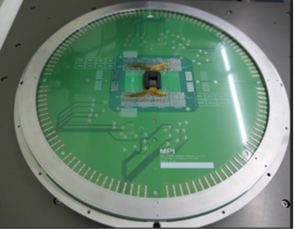HARNESSING INNOVATION - This memory tester probe card with the landing zone for one of the instances of the stacked DRAM demonstrates both the manufactured material meeting the assembly and design objectives, as well as the automated tester equipment that aligns with standard memory test capabilities. Testing is a critical step in DRAM manufacturing. The Intel team developed this automated test harness to evaluate NGDB DRAM, ensuring the memory meets design specifications and passes standard memory tests. (Photo provided by Intel)