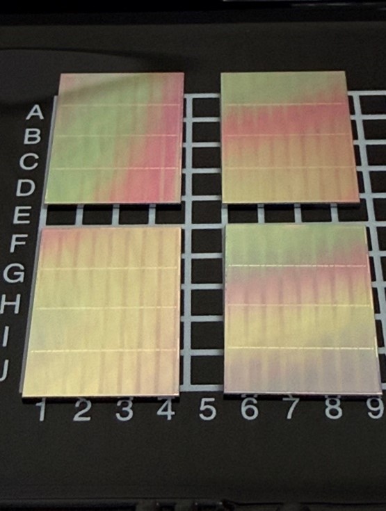 PREPARED FOR TESTING - Four NGDB DRAM test assemblies await testing. Each assembly contains a base layer with eight layers of DRAM stacked on top. (Photo provided by Intel)