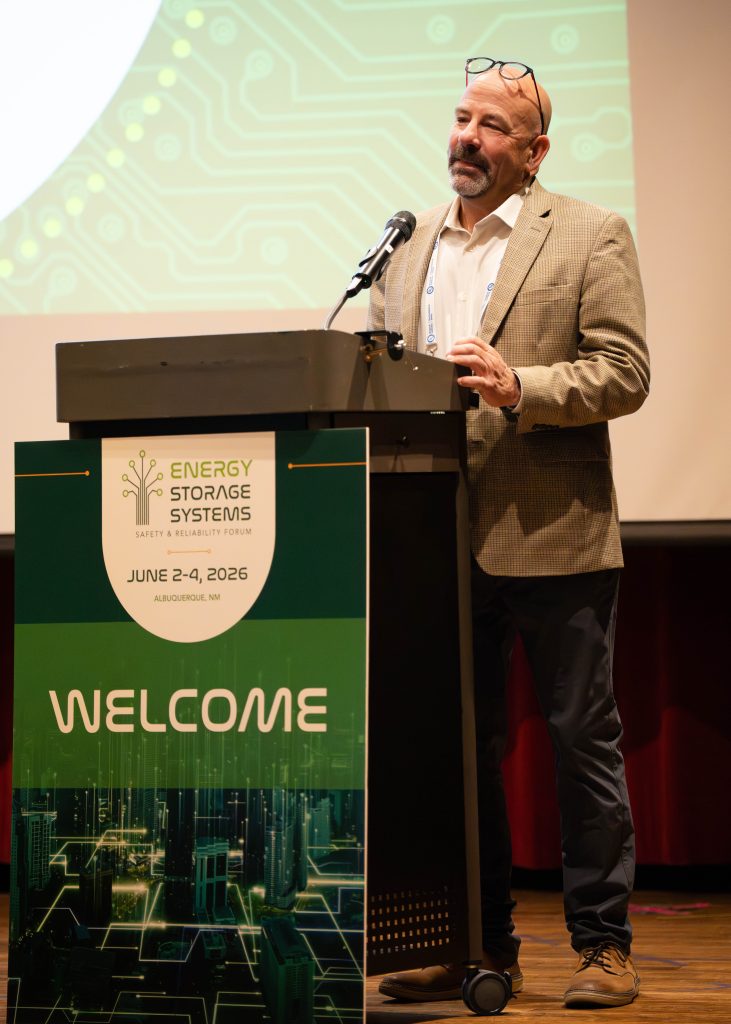 Matthew Paiss addresses the audience about lessons from systems' successes and failures.    / Credit: Alicia Bustillos, Sandia National Laboratories