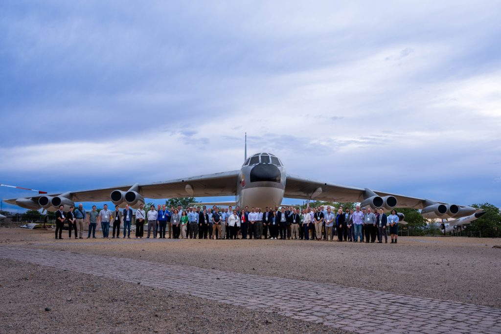 Attendees gather outside the National Museum of Nuclear Science and History for a group photo following the 2026 Energy Storage Systems Safety & Reliability Forum. / Credit: Alicia Bustillos, Sandia National Laboratories