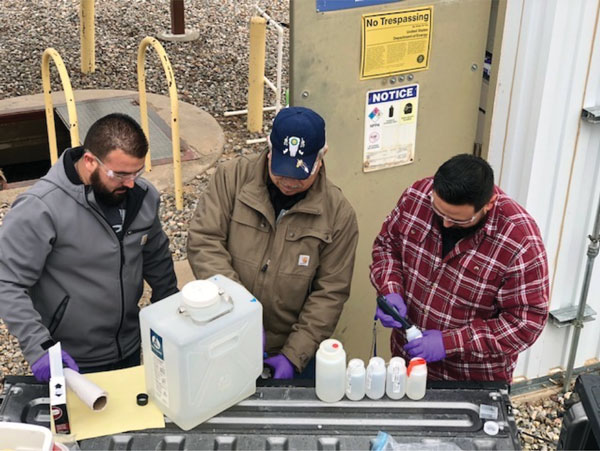 field crew takes water samples