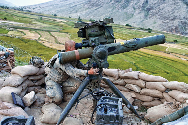 soldier aims missile launcher