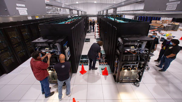 Workers assemble the Manzano High Performance Computing system.