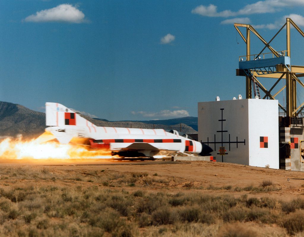 Image depicting the 1988 rocket sled test right before collision.