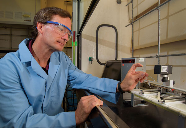 Nanobiologist Mike Kent doing lab work