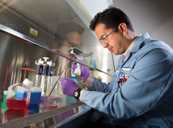 Oscar Negrete doing lab work