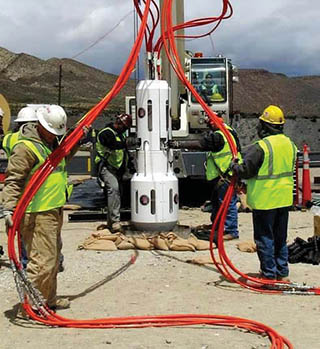 Workers at the Nevada National Security Site position equipment to conduct the SPE experiments