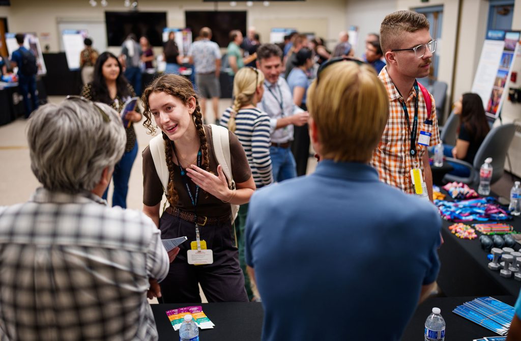 Sandia staff chat with representatives from nuclear deterrence groups during Careerapalooza.