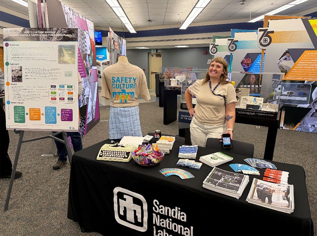 A systems engineer helps educate the workforce during the Looking Back, Moving Forward talk at Steve Schiff Auditorium.
