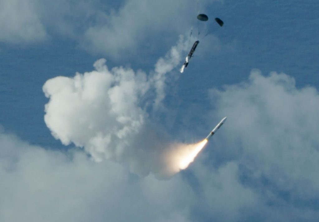 An MRBM with a Hypersonic Target Vehicle front end is air launched from a C-17 aircraft off the coast of the Pacific Missile Range Facility in Hawaii.