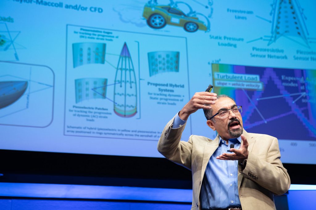 A researcher presents his project during the Labswide Innovation Faceoff event at Steve Schiff Auditorium.