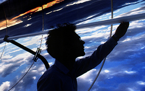 Man inspecting a solar panel