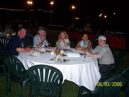 Participants dining outside at night