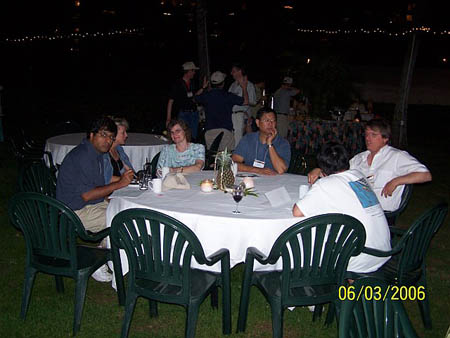Participants dining outside at night