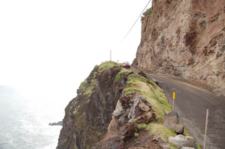small mountain road near edge of cliff