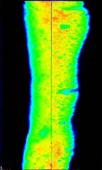 Matrix imbibition from a flowing slot fracture formed by mating two 60x15x2.5 cm slabs of volcanic tuff.