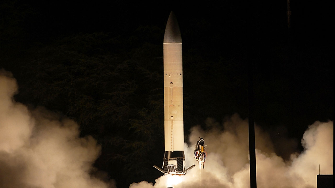 Rocket launching at night