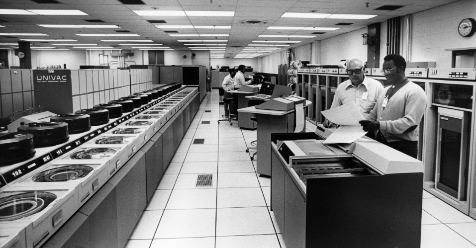 Karl Waibel (left) and Craig Jones in charge of new Univac operations and operating systems, respectively