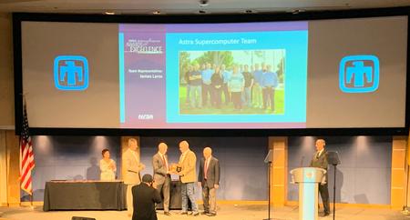 Astra Supercomputer Team representative James Laros Accepts the Defense Programs Award of Excellence