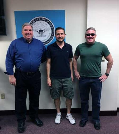 Dan Torgler (left) welcomes Sandia National Laboratories’ William Atkins (center) and Benjamin Anderson.