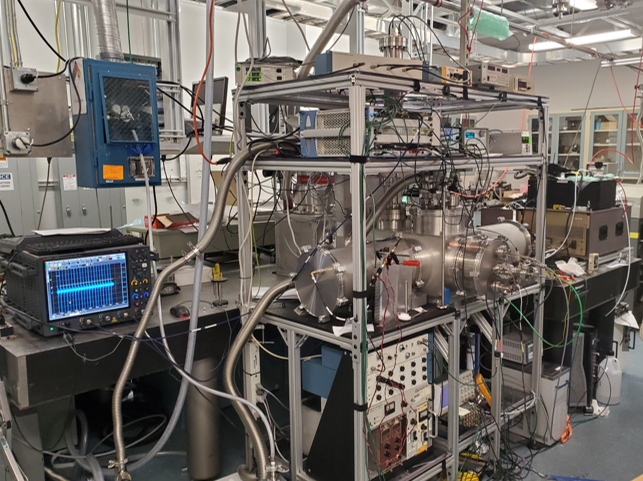 Figure 2a: Photograph of the vacuum chamber and associated electronics used to record broadband rotational spectra and VUV photoionization TOF mass spectra.