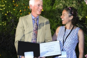 Robert Barlow (left) with former Sandian and current research collaborator Simone Hochgreb of Cambridge University, who presented him with the Alfred C. Egerton Gold Medal at the 35th International Symposium on Combustion.