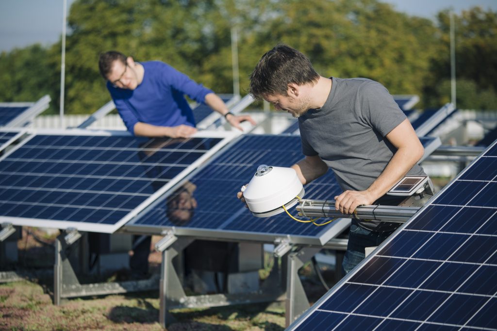 Dr. David Daßler, left, and Technician Jens Fröbel. Courtesy of Sven Döring / Agentur Focus © 2015.