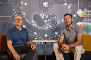 Materials scientists, Patrick Doty, left and Isaac Aviña, right, teamed up to create a patch that can better prevent damage of healthy tissue in proton radiation cancer treatment. Watch/download b-roll video. (Photo by Spencer Toy) Click on the thumbnail for a high-resolution image.