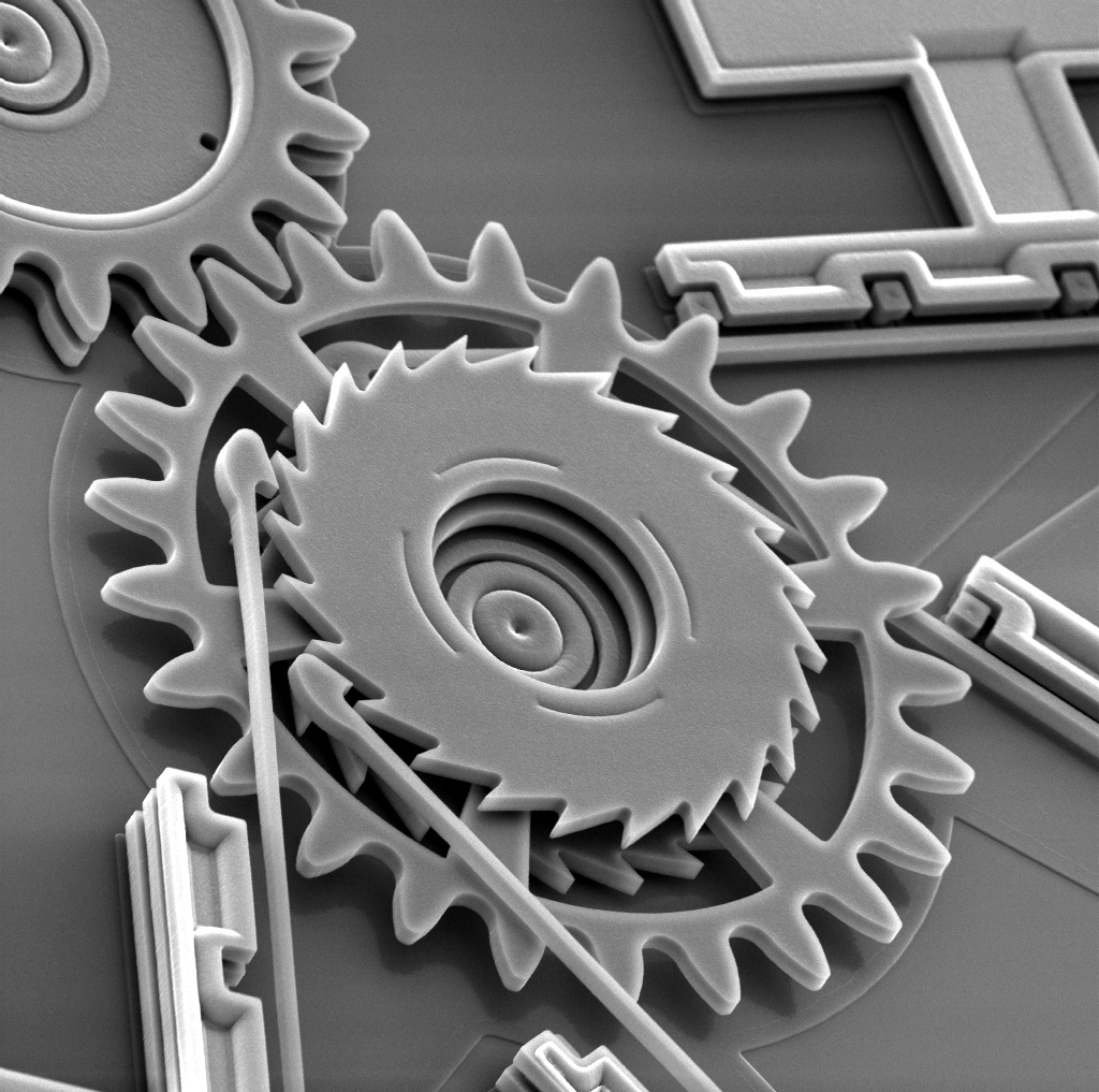 FIVE-LEVEL TECHNOLOGY -- This image shows a ratcheting system that was fabricated in the five-level technology. Twenty of these gears fit on a period in a newspaper sentence.