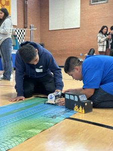 Students from Carlsbad Middle School make alterations to their electric car after a trial run in the 2023 New Mexico Electric Car Challenge. (Photo courtesy Sandia National Labs) Click on the thumbnail for a high-resolution image.