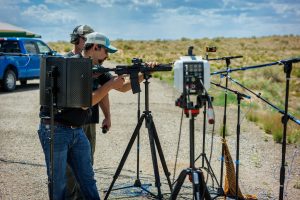 Matias Roybal and a fellow member of the Ridgeline team conduct high-fidelity acoustic tests on their suppressors with the help of Sandia employees Michael Denison, Stephen Aulbach and Chad Heitman. (Photo by Bret Latter) Click on the thumbnail for a high-resolution image.