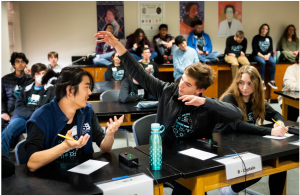 <strong>Competitors in the 2023 New Mexico Regional Science Bowl discuss a question and answer during the speed round.</strong> (Photo by Craig Fritz) Click on the thumbnail for a high-resolution image.