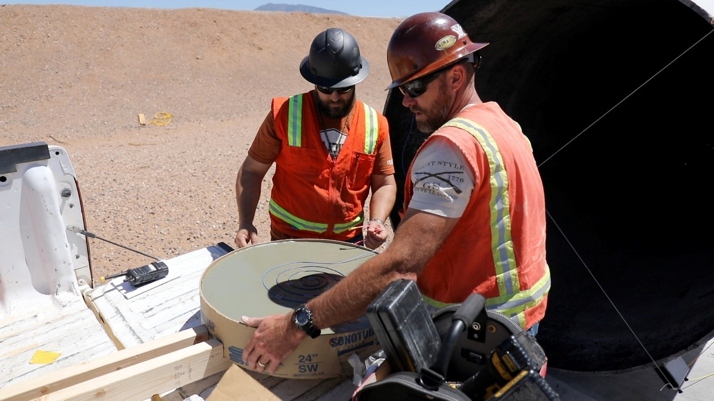 Arming & Firing personnel installing a charge at the 120-ft Blast Tube Facility.