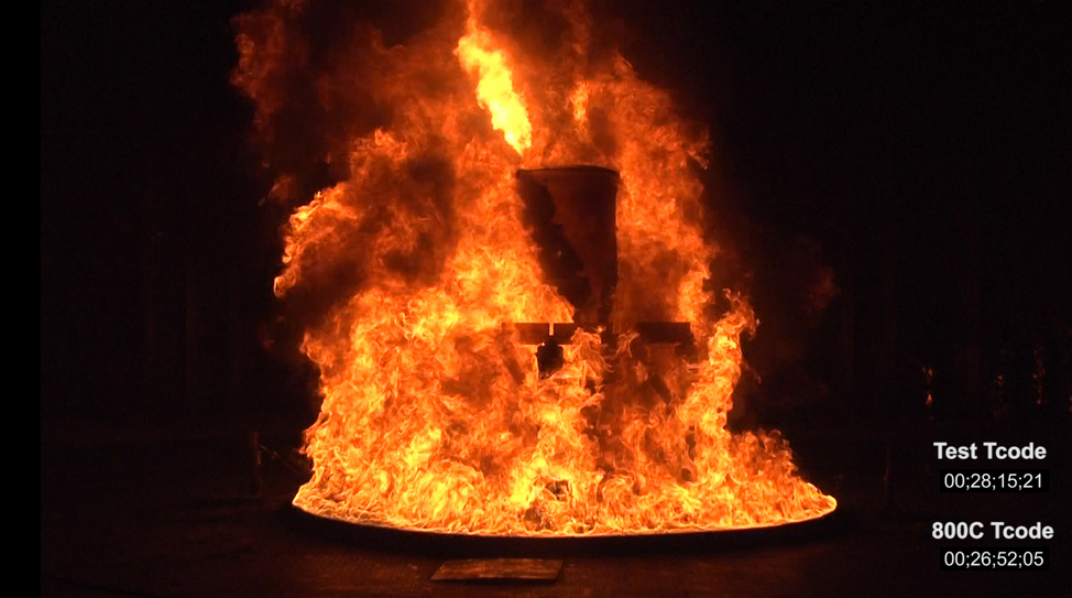 A 10 CFR Regulatory fire for Radioactive Material Shipping Packages in an indoor setting. This approach allows full control of the boundary conditions and insures meeting the regulatory requirements.
