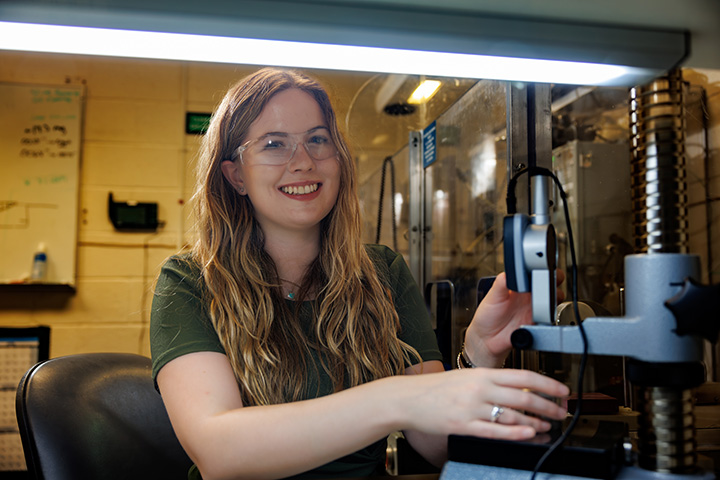 Female intern working in laboratory