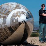 Ryan Kristensen stands next to a Polaris missile