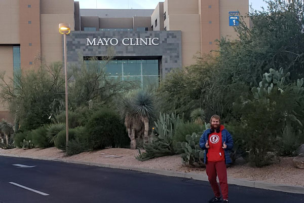 Lawrence Allen in front of Mayo Clinic