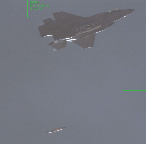 fighter jet drops mock B61-12