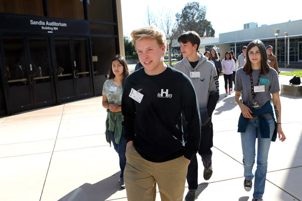 students enter Sandia campus