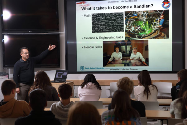 scientist talks to students