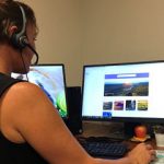 health educator conducts virtual wellness visit with employee