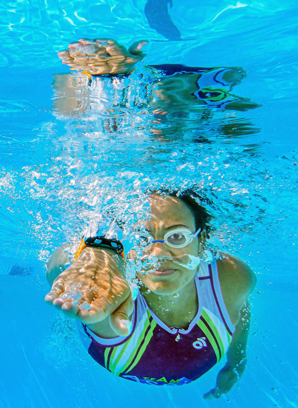 Under water photo of Sara Draper swimming